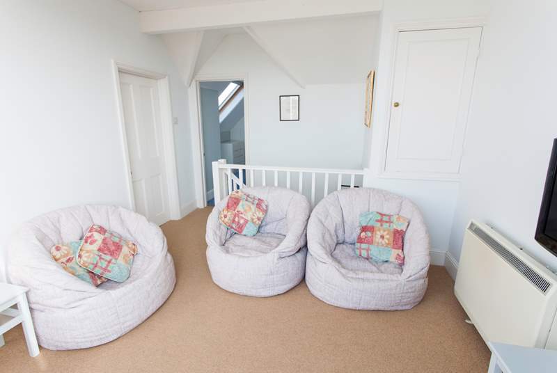 The snug is perfect for the children to watch TV whilst the adults enjoy a glass of wine on the roof terrace.