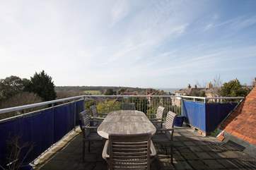A lovely roof terrace perfect for al fresco dining in the sunshine and surrounded by views across to The Solent and nearby nature reserve.