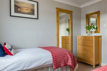 Oak furniture throughout providing ample storage.