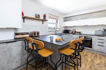 The modern and bright kitchen.
