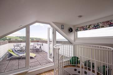 The sun-room leads out onto the gorgeous rooftop terrace.