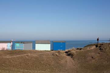 Lining the nearby beach, there are some unique beach huts converted from old railway wagons with views out to St Helens Fort.