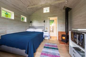 The king-size bed and cosy wood-burner make this a perfect retreat in the winter too.