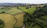 Encompassed by peaceful patchwork farmland. - Thumbnail Image