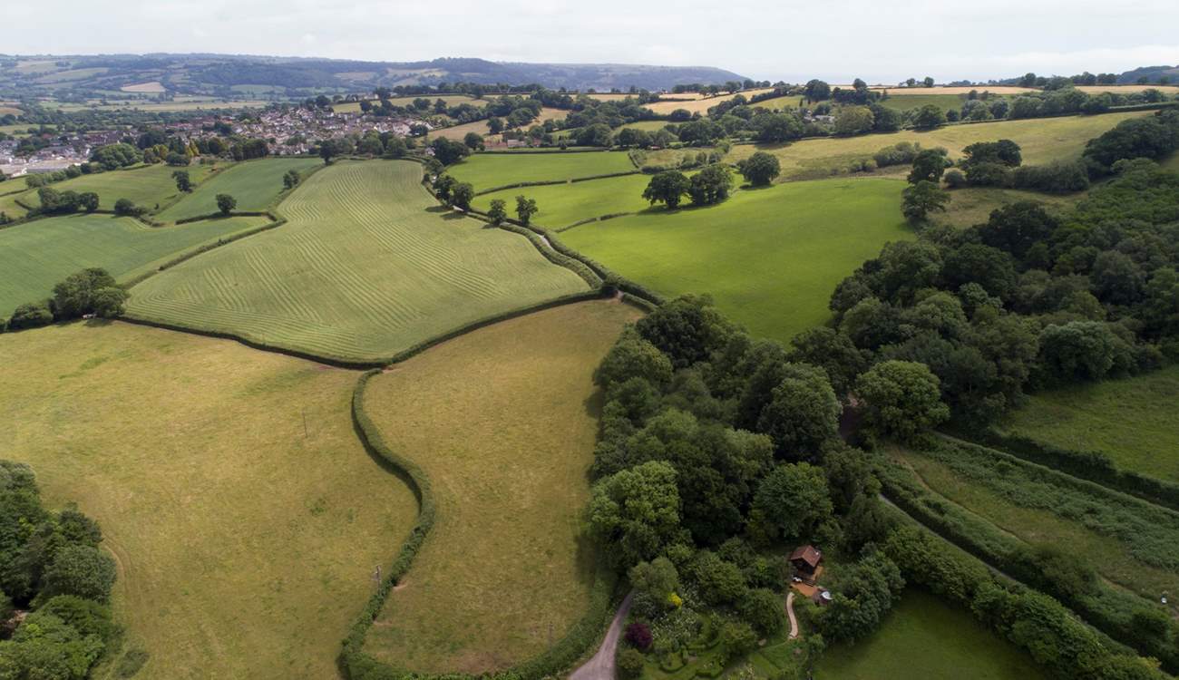 Encompassed by peaceful patchwork farmland.