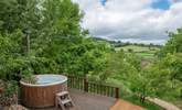 Soak up the stunning countryside views from your dreamy hot tub.  - Thumbnail Image