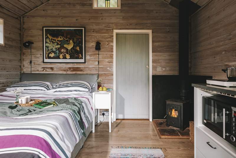 With a comfy king-size bed and warming wood-burner for those out of season escapes.