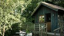 Step out onto your sun-dappled deck. 