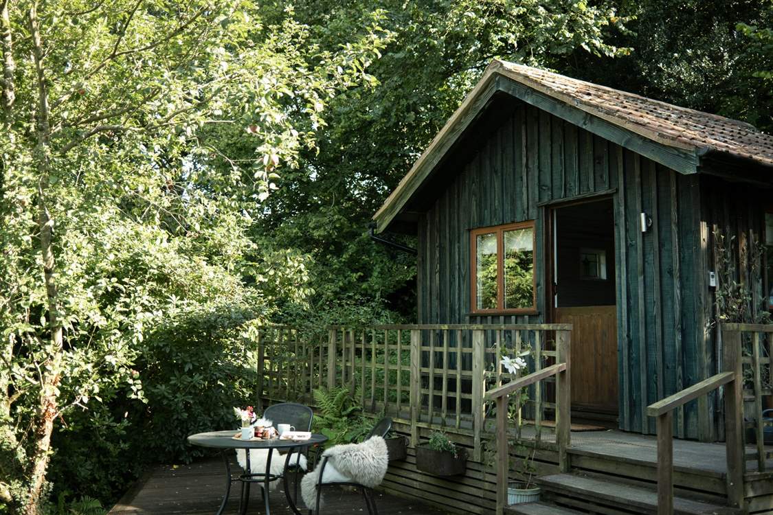 Step out onto your sun-dappled deck.