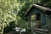 Step out onto your sun-dappled deck.