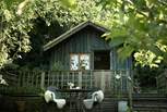 Snuggled into the hillside, Old Orchard Cabin is the most enchanting escape back to nature.