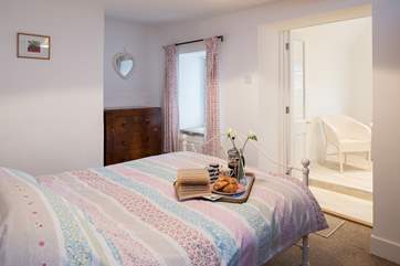 Get a great night's sleep in the comfortable and well decorated master bedroom.