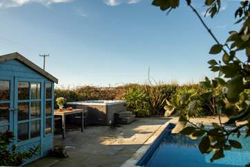 The hot tub can be enjoyed year-round.