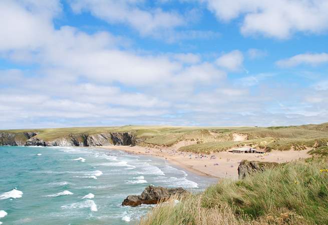 The beautiful golden sands of Holywell Bay are only a short drive away.