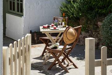 Outside there is a lovely enclosed sunny patio.