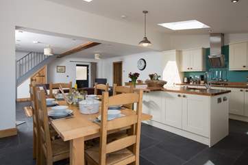 The kitchen-area also has a huge island/breakfast bar.