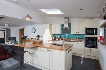 Another view of the spacious kitchen.