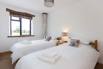 This is the twin bedroom on the first floor. The flue from the wood-burner is double lined and has passed all the required safety standards.