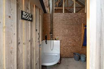 Been on a muddy walk and have a muddy dog? The boot room is there to wash off the dog and the walking boots.