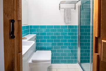 The en suite shower-room for bedroom one on the ground floor.