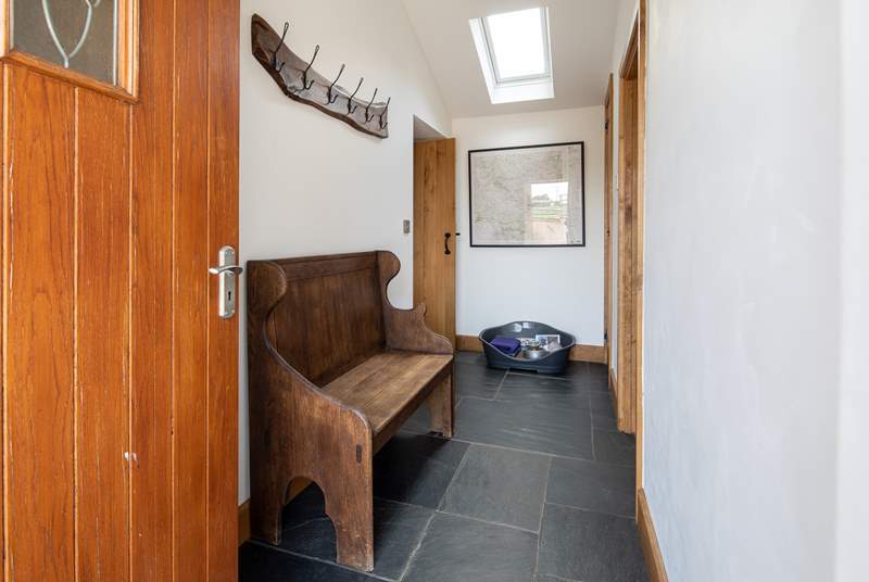The flagstone flooring and little hallway make this a really practical place to stay with a dog.
