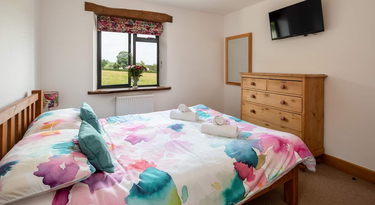 Bedroom two is on the first floor and has a Smart TV and storage for your holiday belongings.