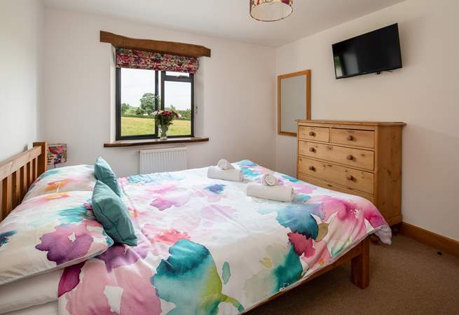 Bedroom two is on the first floor and has a Smart TV and storage for your holiday belongings.