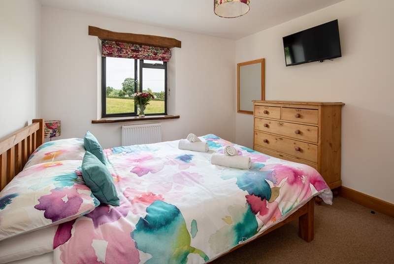 Bedroom two is on the first floor and has a Smart TV and storage for your holiday belongings.