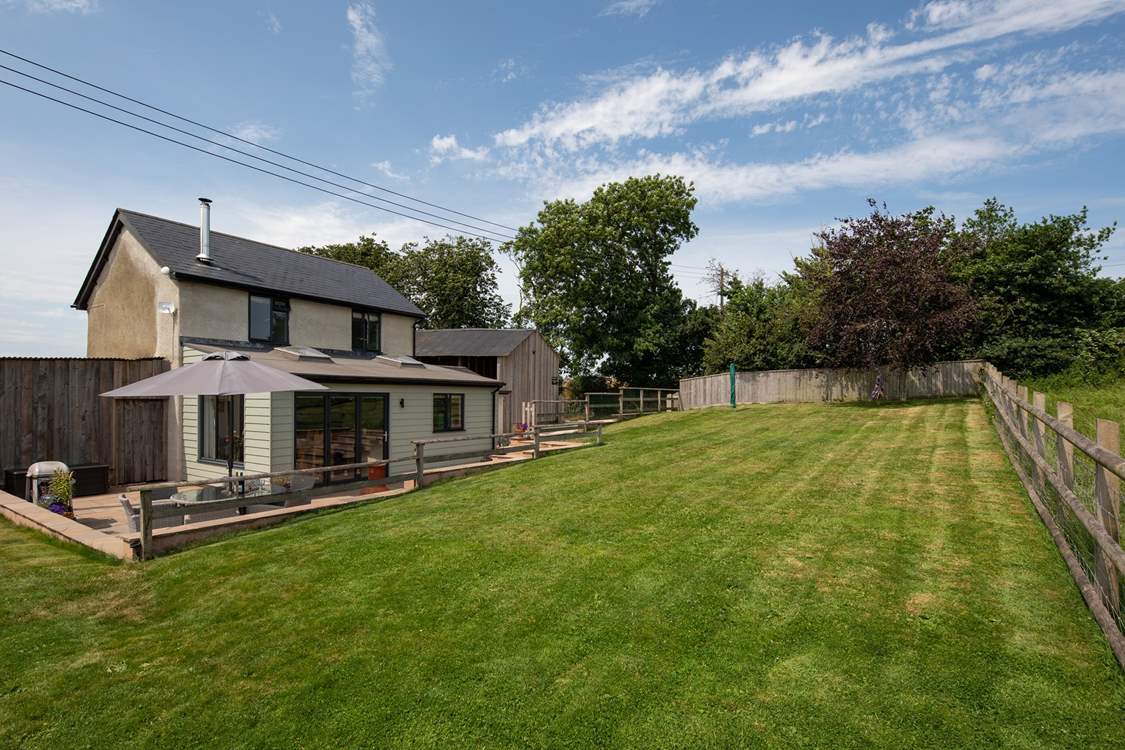 The patio and garden are enclosed making it perfect for letting children and dogs run free.