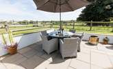 Dine al fresco surrounded by gorgeous countryside views. - Thumbnail Image