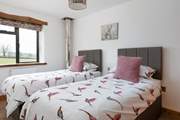 This room can be configured as super-king or twin beds.