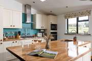 The kitchen-area also has a huge island/breakfast-bar.