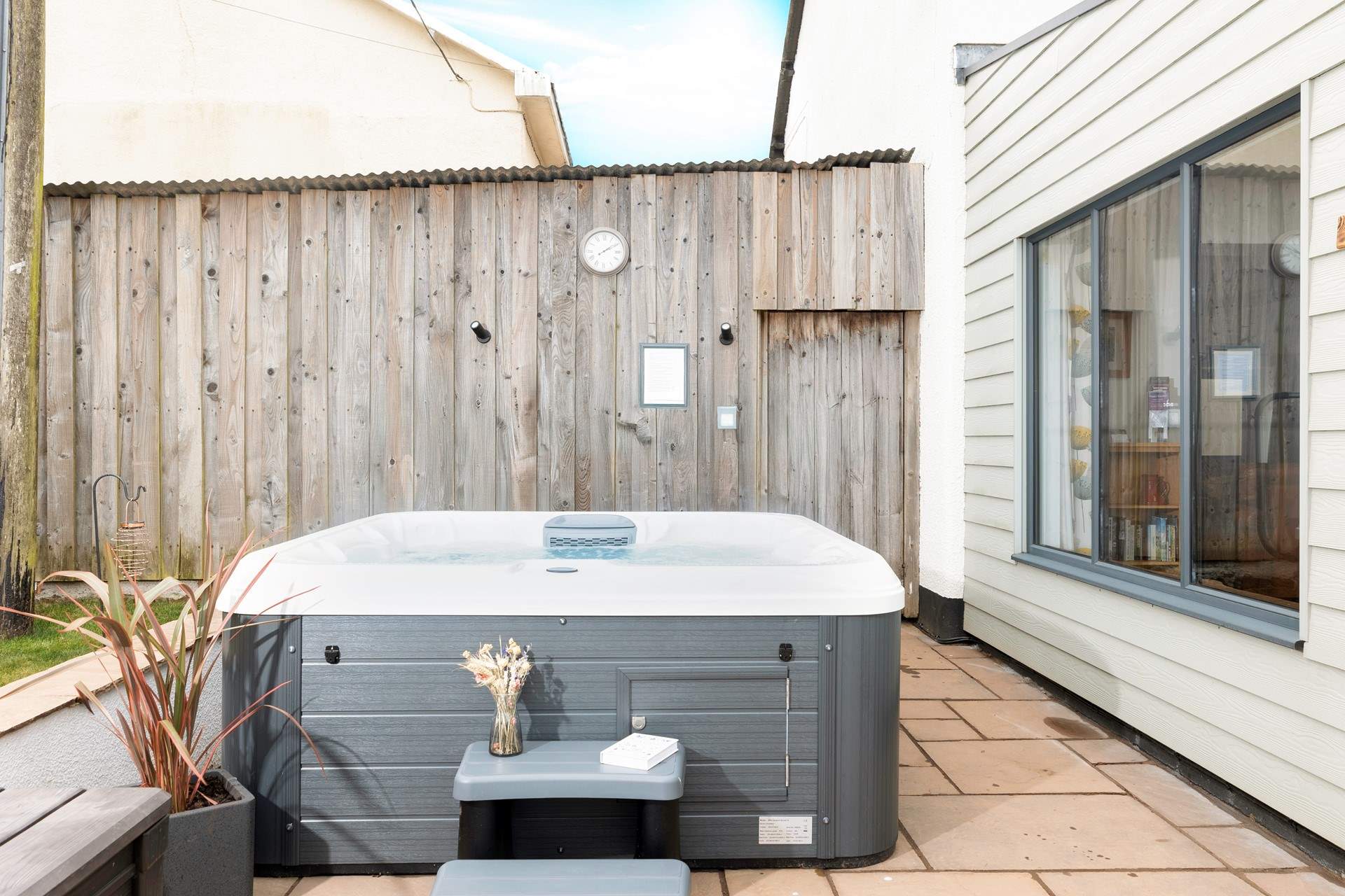 Just outside the dining area, you can bubble away in this fabulous hot tub. 
