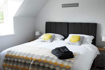 Bedroom 2 is at the front of the cottage and has a six foot 'zip and link' bed, which can be made up as two three-foot single beds if you prefer.