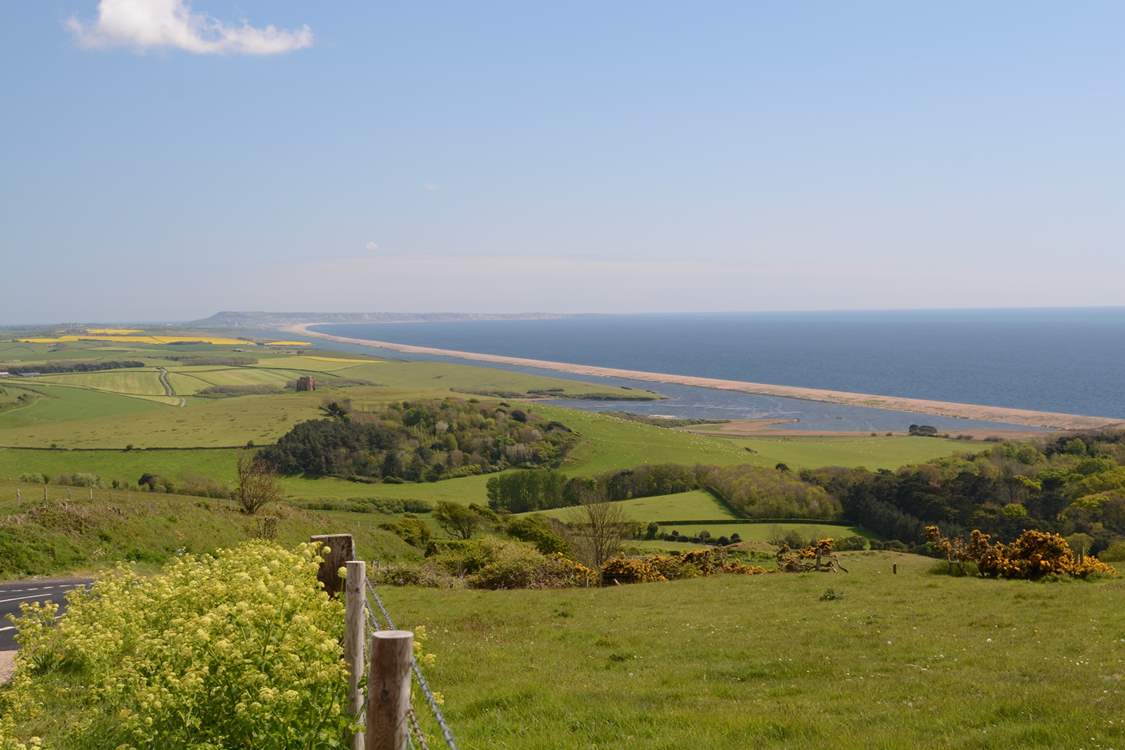 This spectacular view is of Chesil Beach, with Portland in the background taken from the Jurassic Coast road between Weymouth and Bridport; fabulous views in both directions.