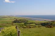 This spectacular view is of Chesil Beach, with Portland in the background taken from the Jurassic Coast road between Weymouth and Bridport; fabulous views in both directions.