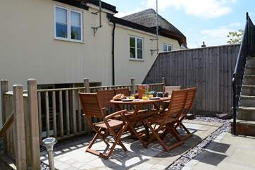 The raised deck behind the cottage has steep steps, please supervise children. Steps and a little gate continue up to the parking-area.