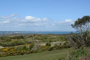 Taken from the Corfe to Studland Road, from this viewpoint you can see Poole's natural harbour in one direction, and in the other Bournemouth bay. across to the Isle of Wight.