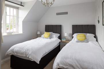 Bedroom 2 has a six-foot 'zip and link' bed, seen here as two three-foot singles, but can be made up as a super-king size.