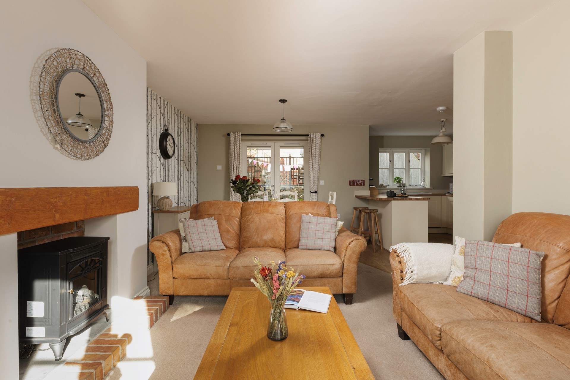 The sitting-area has books, games and a wood-burner effect electric stove for cosy winter evenings.