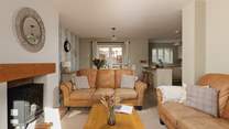 The sitting-area has books, games and a wood-burner effect electric stove for cosy winter evenings.