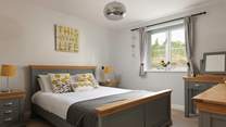 Bedroom 1 has a comfy five-foot bed and en suite shower-room; it is at the back of the cottage.