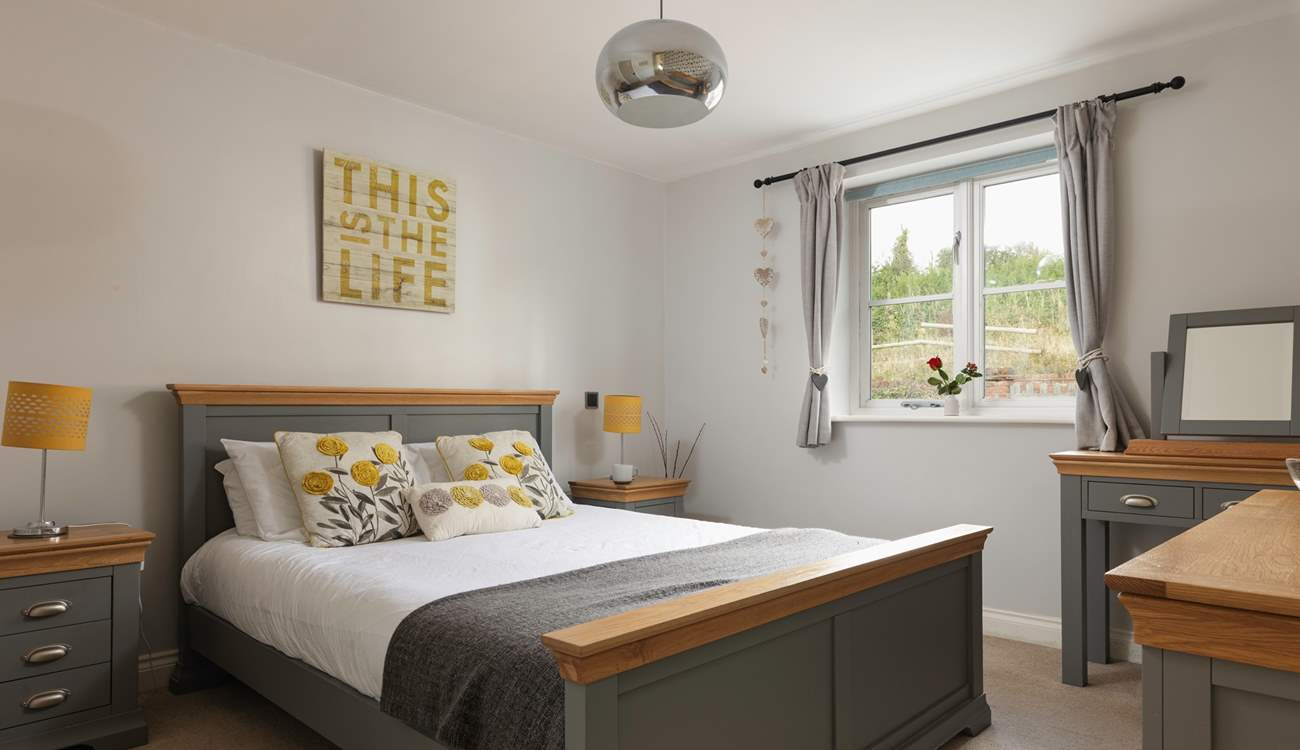 Bedroom 1 has a comfy five-foot bed and en suite shower-room; it is at the back of the cottage.