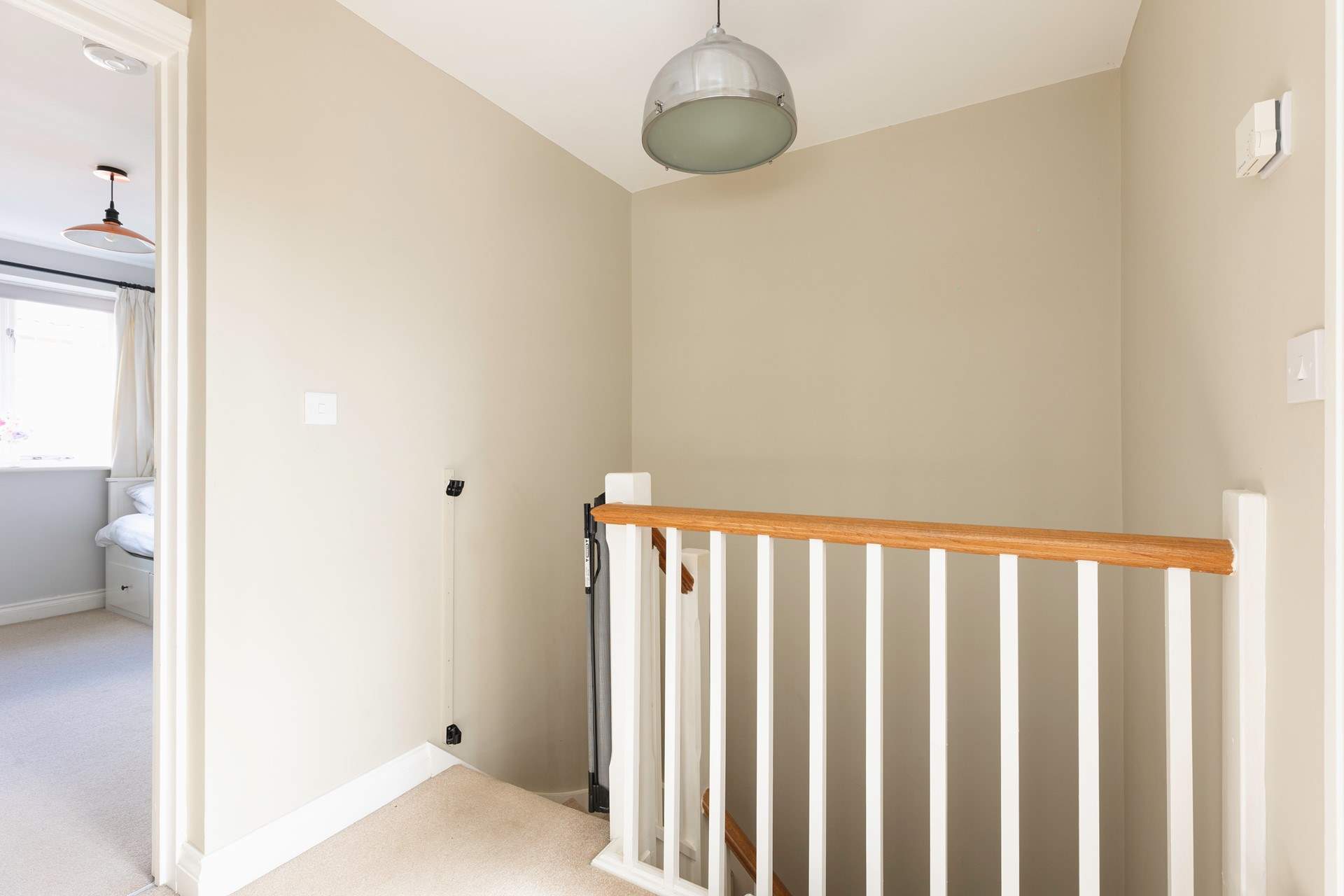 Head upstairs to the bedrooms.