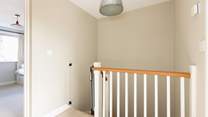 Head upstairs to the bedrooms.