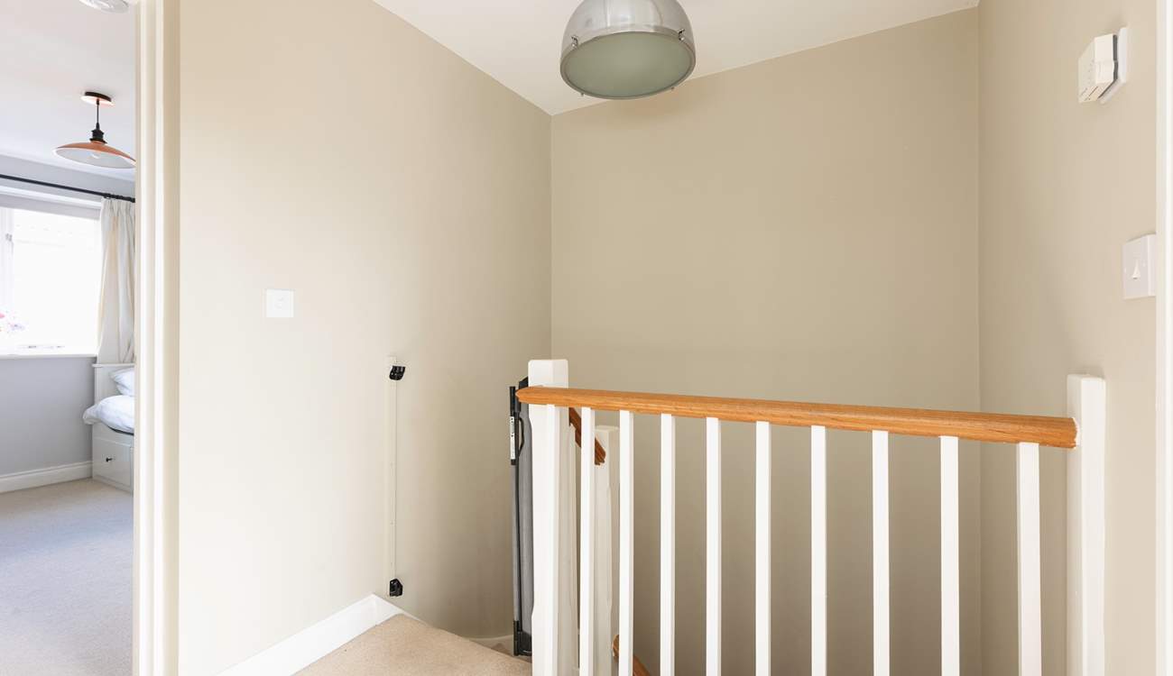 Head upstairs to the bedrooms.