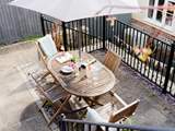 Enjoy summer evenings on the raised terrace.