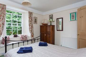 Pretty bedroom 2 has estuary views and a double bed! Cosy and super comfy.