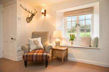 A lovely spot to sit and enjoy the view over the garden.