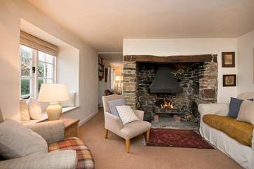 The first sitting-room leads through to the second sitting-room.